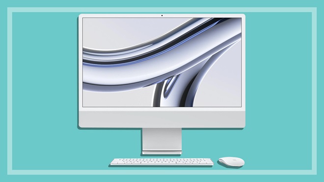 Apple iMac 24-inch on a teal background